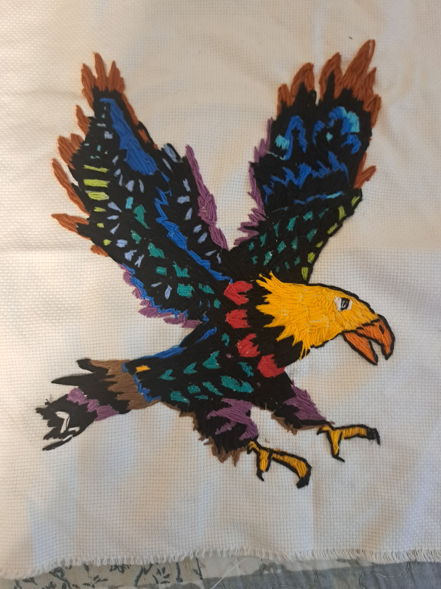 embroidered eagle in mid-flight