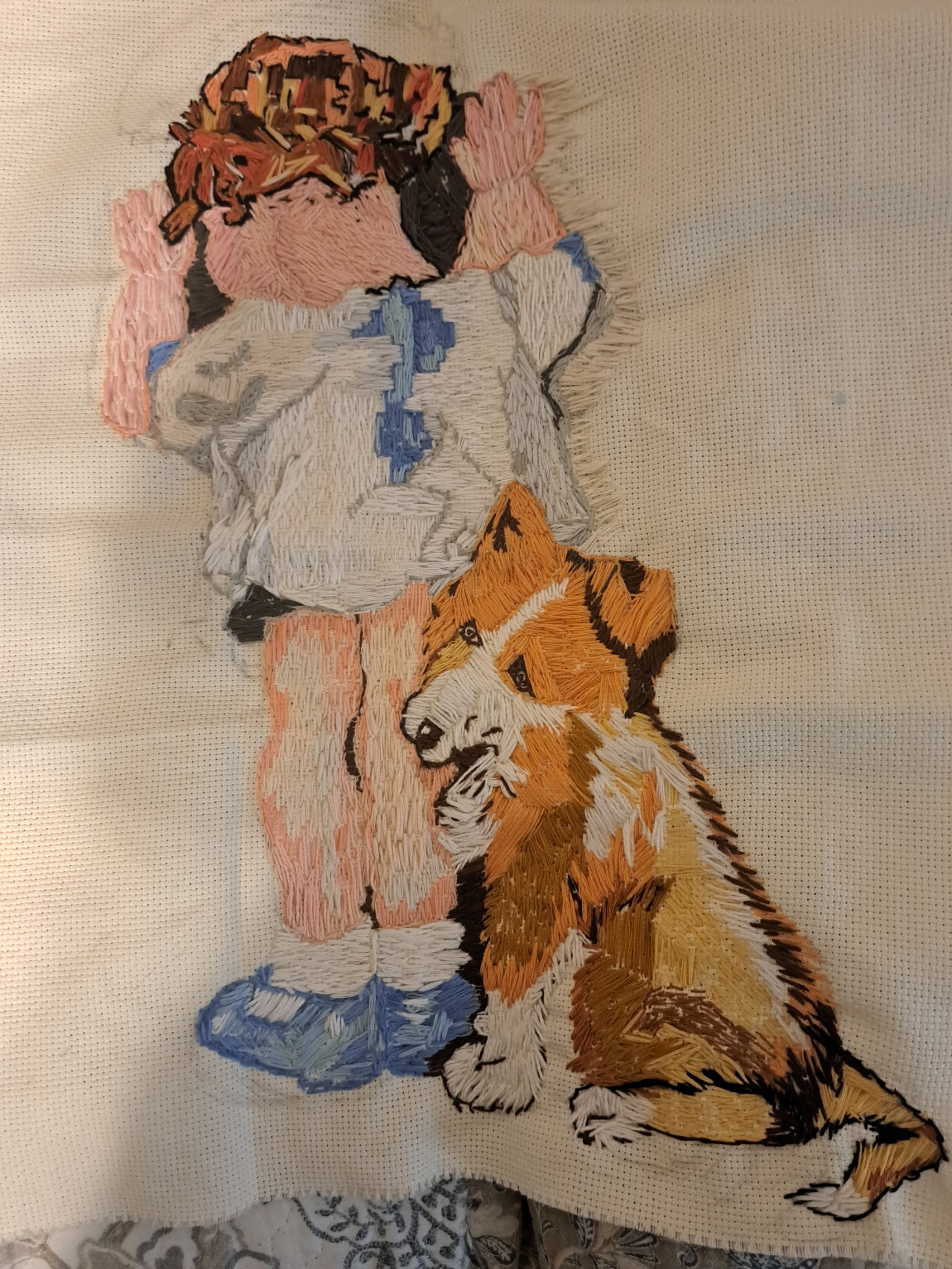 embroidered girl with corgi puppy